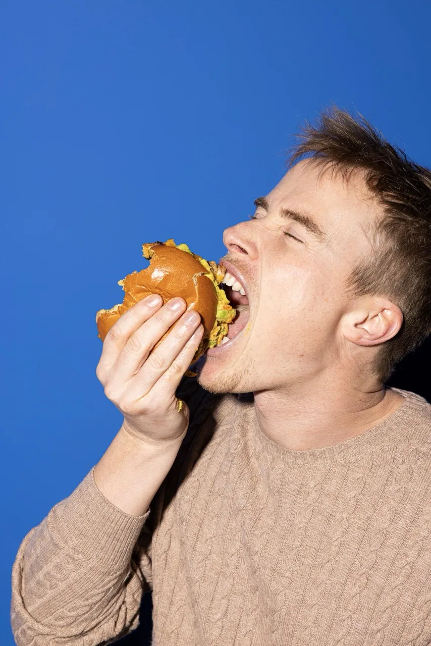 Person eating burger